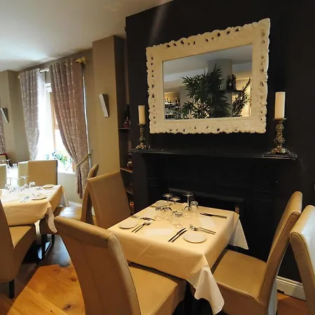 Отель The Coach House Оранмор