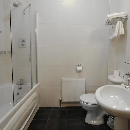The Coach House Отель